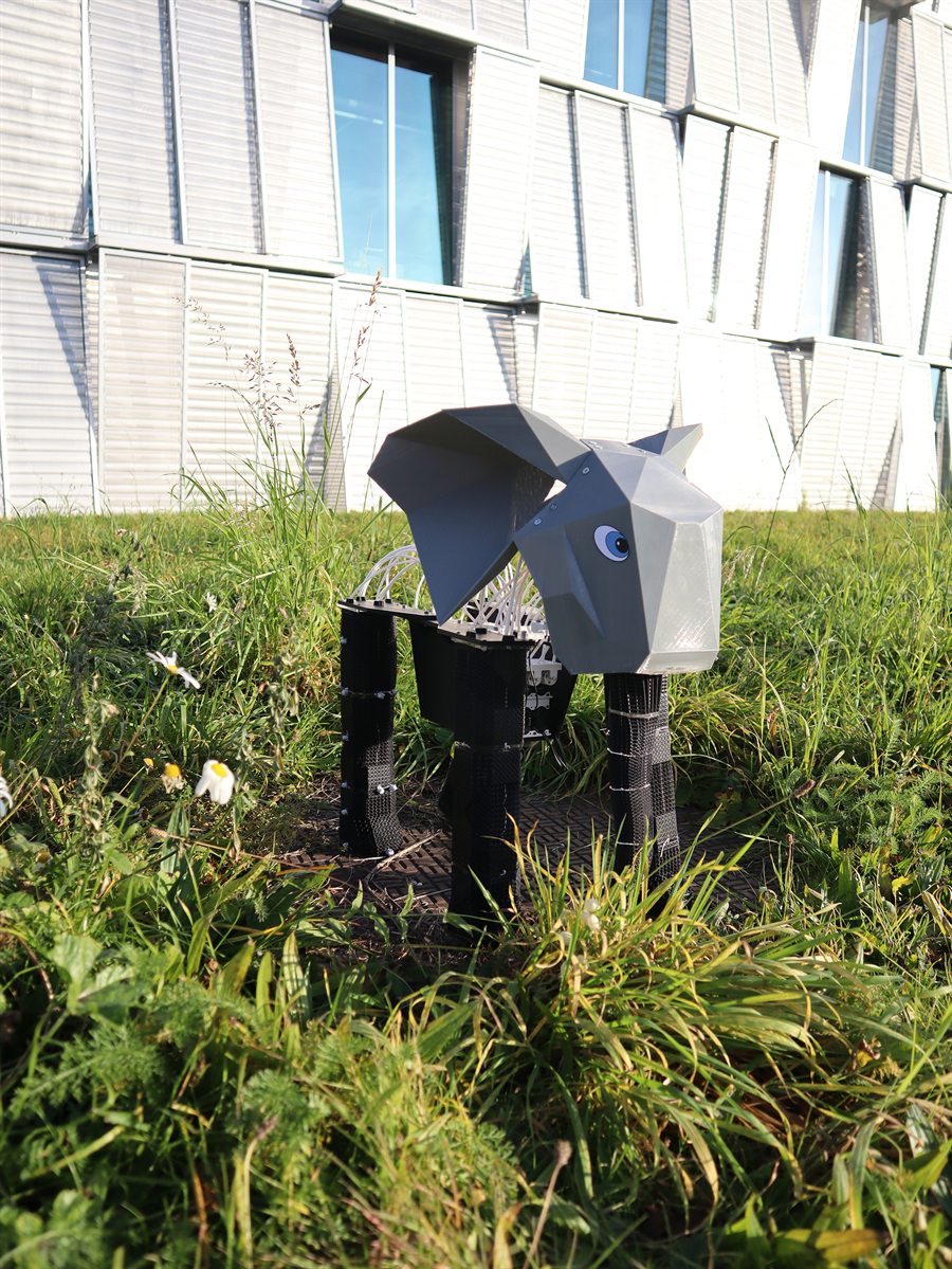 Lattice elephant robot walking on grass